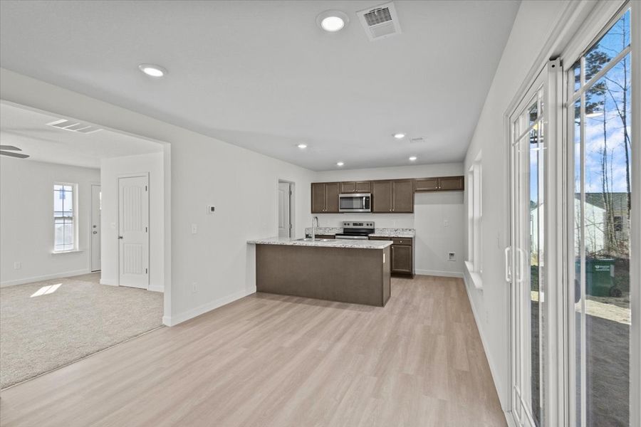 Representative furnished interior of a home built from the Roebuck by Enchanted Homes in Las Palomas Country Club Estates, La Vernia (Image 9).