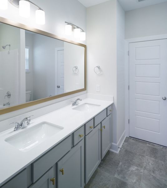 Representative furnished interior of a home built from the The Harper by Cothran Homes in Holly Ridge, Greenville (Image 11).