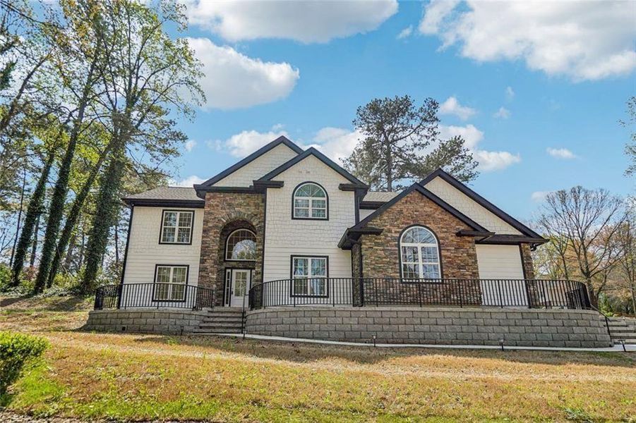 Front exterior of a new home in , Grayson, GA, highlighting curb appeal (Image 27).