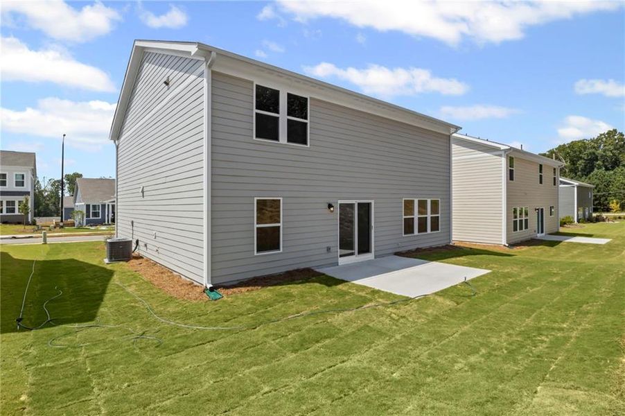 Front exterior of a new home in Sage Woods, Dallas, GA, highlighting curb appeal (Image 2). Front exterior of a new home in Sage Woods, Dallas, GA, highlighting curb appeal (Image 2).