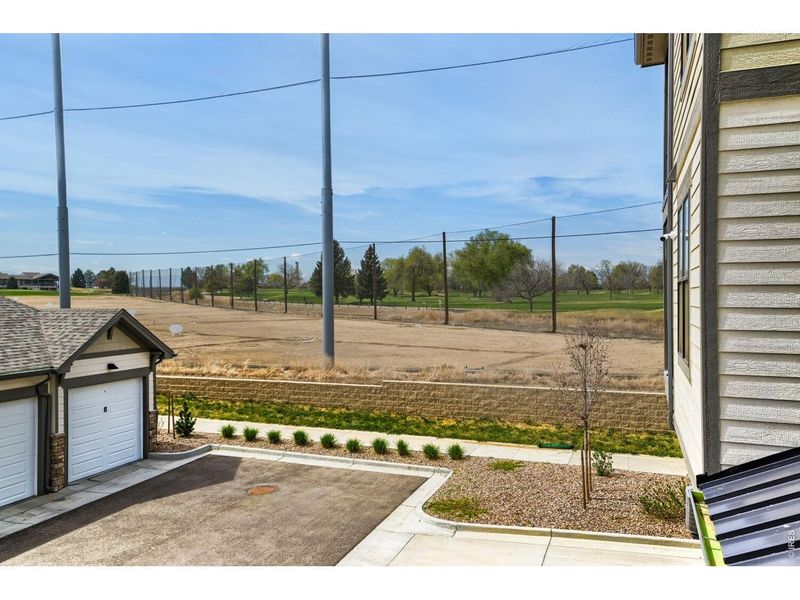 Exterior details and patio area of a home in Highlands at Fox Hill - The Flats, Longmont (Image 25).