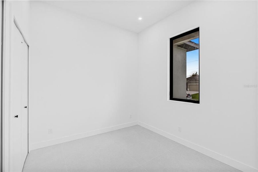 Spacious, unfurnished interior of a new home in , Port Charlotte (Image 24).