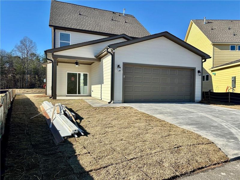 Exterior details and patio area of a home in Marble Tree, Ball Ground (Image 4).