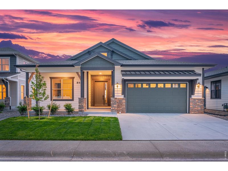 Front exterior of a new home in , Windsor, CO, highlighting curb appeal (Image 20).
