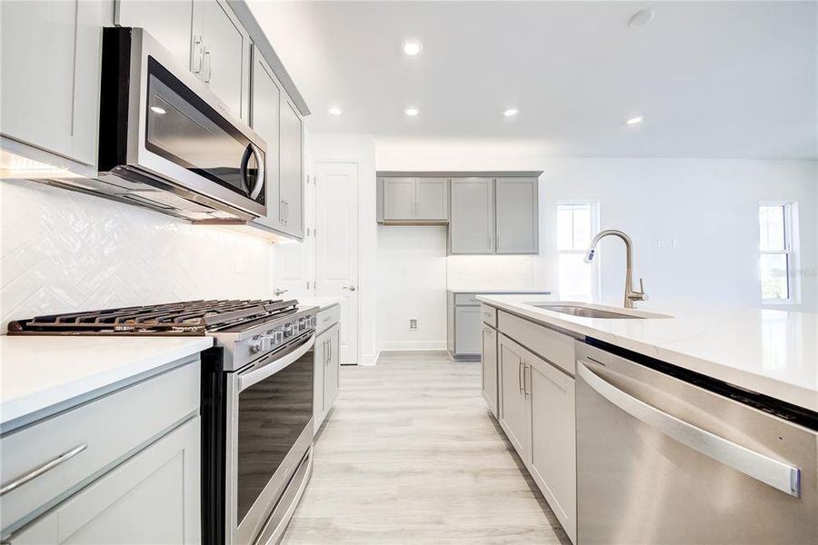Furnished interior view inside a new home in Bungalow Walk at Lakewood Ranch, Sarasota (Image 9).