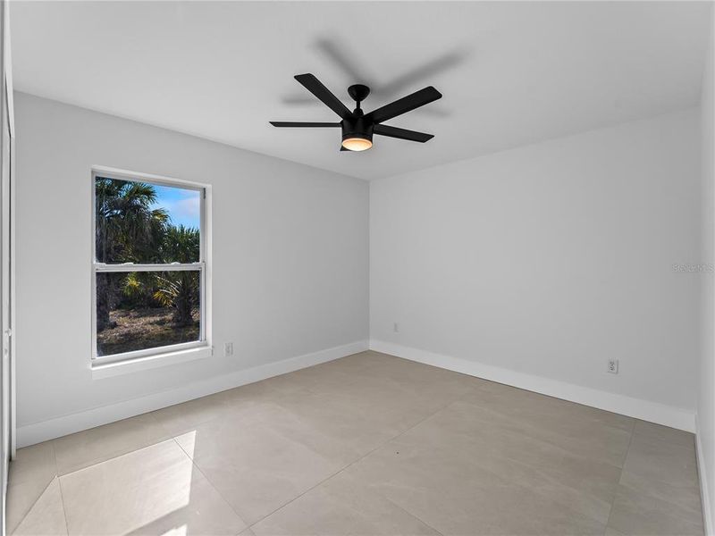 Spacious, unfurnished interior of a new home in , Port Charlotte (Image 43).