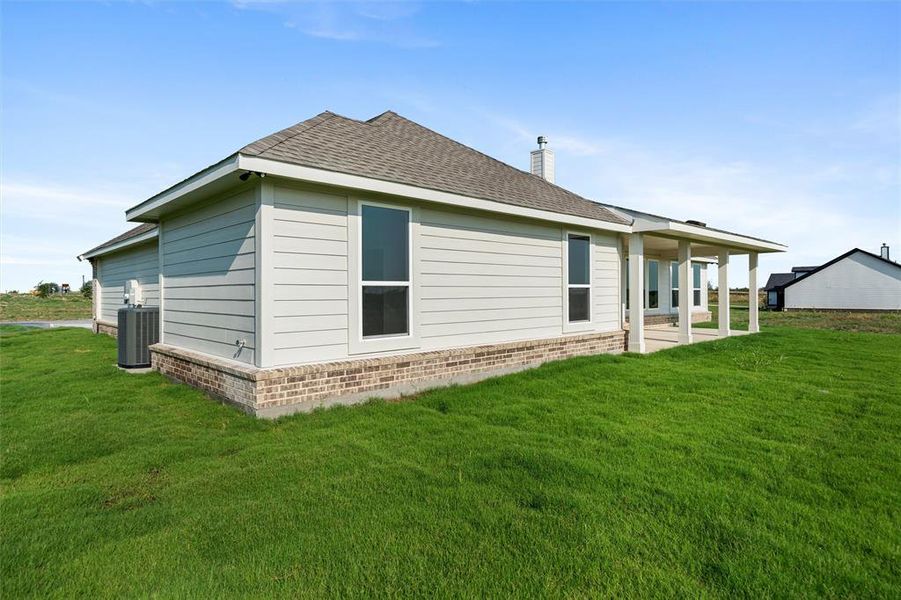 Front exterior of a new home in Fairview Meadows, New Fairview, TX, highlighting curb appeal (Image 17). Front exterior of a new home in Fairview Meadows, New Fairview, TX, highlighting curb appeal (Image 17).