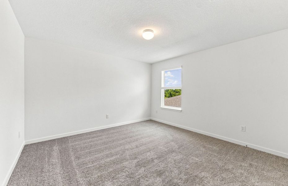 Spacious, unfurnished interior of a new home in Vida's Way, Wesley Chapel (Image 18).