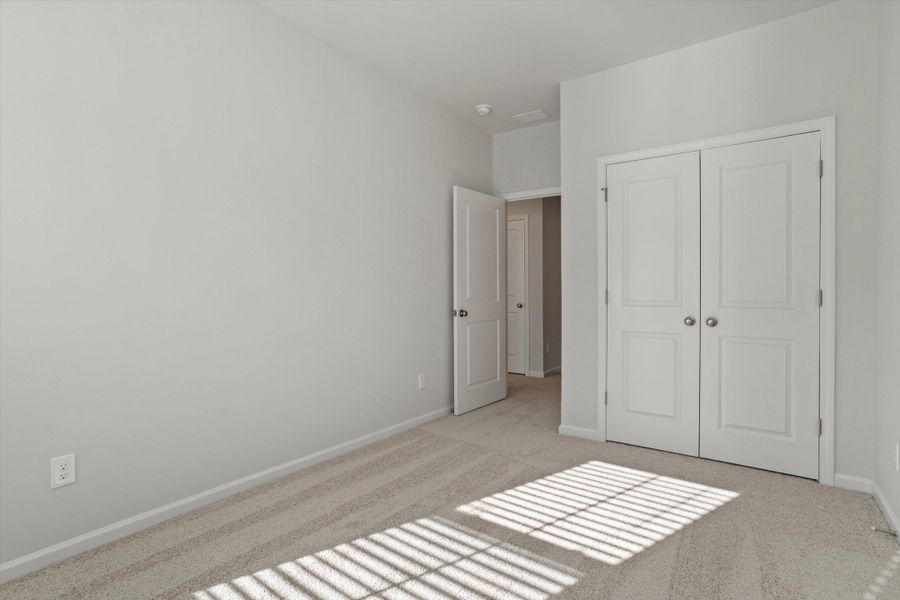 Spacious, unfurnished interior of a new home in West Main Townhomes, Sanford (Image 27).
