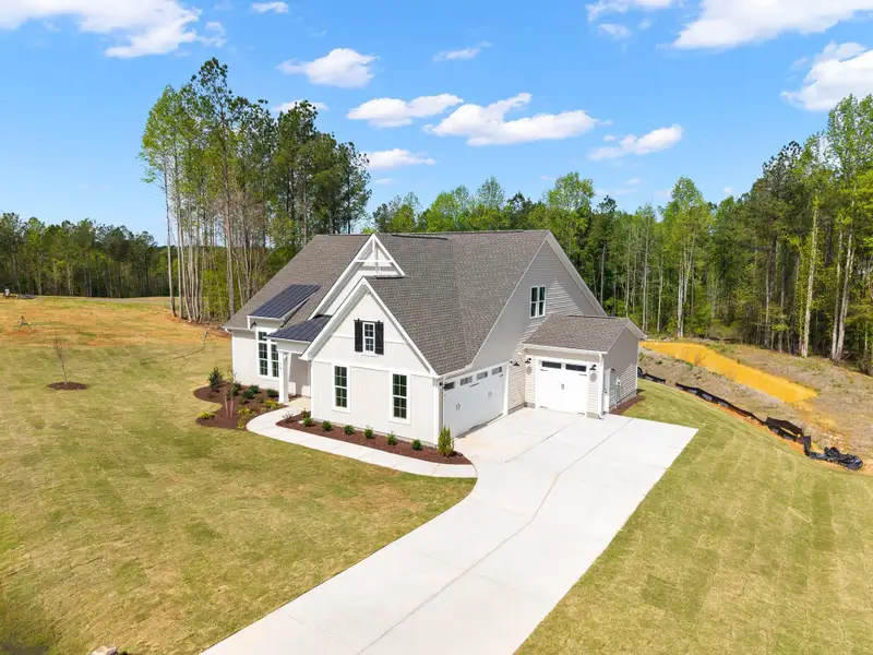 Representative exterior photo of a completed home built from the The Bradley by RobuckHomes in Baylee Ridge, Selma, NC (Image 55). Representative exterior photo of a completed home built from the The Bradley by RobuckHomes in Baylee Ridge, Selma, NC (Image 55).