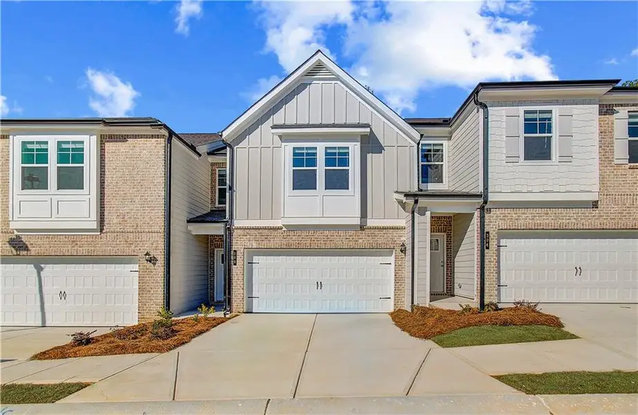 Front exterior of a new home in Diamante, Stockbridge, GA, highlighting curb appeal (Image 22).
