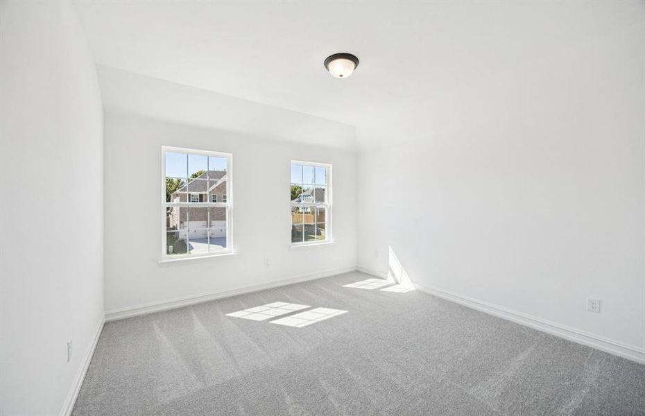 Inviting bedroom offering soft natural light Inviting bedroom offering soft natural light