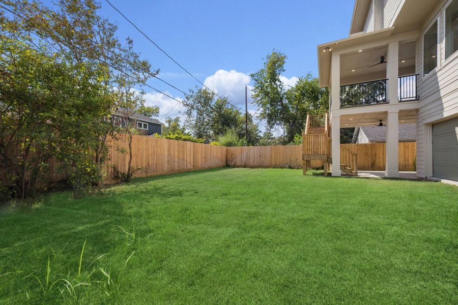 Plenty of room for outdoor fun or gardening in this spacious backyard Plenty of room for outdoor fun or gardening in this spacious backyard