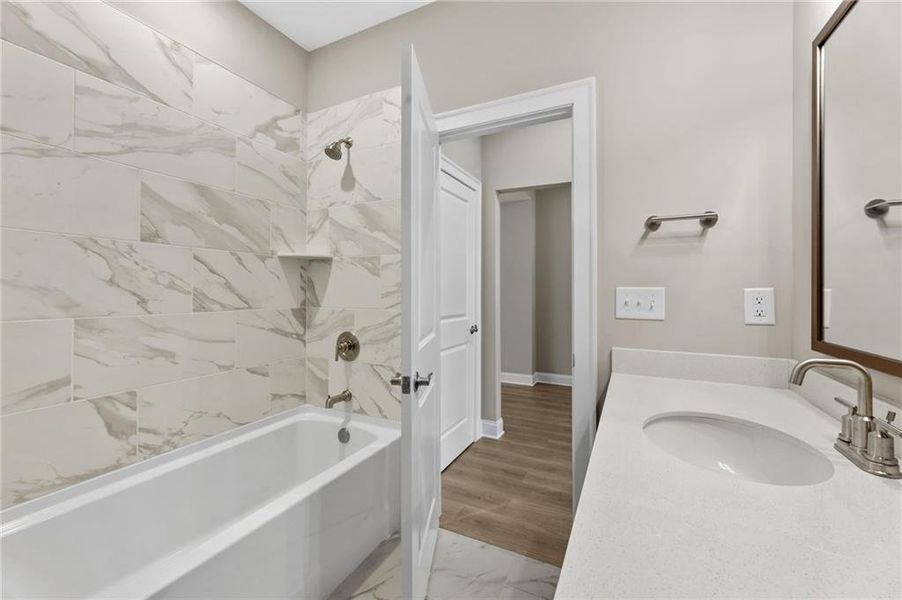 Furnished interior view inside a new home in The Courtyards at Bailey Farm, Dacula (Image 7).