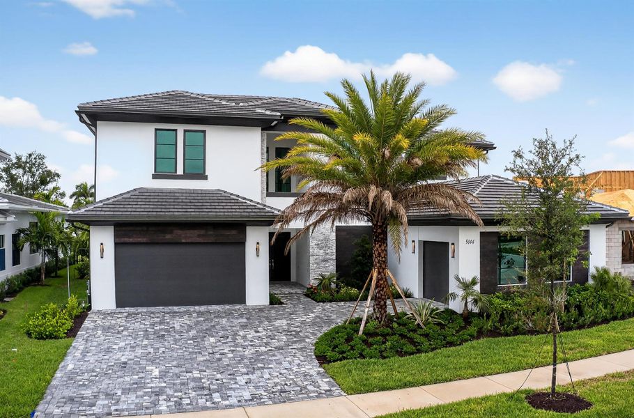 Front exterior of a new home in , Palm Beach Gardens, FL, highlighting curb appeal (Image 31).