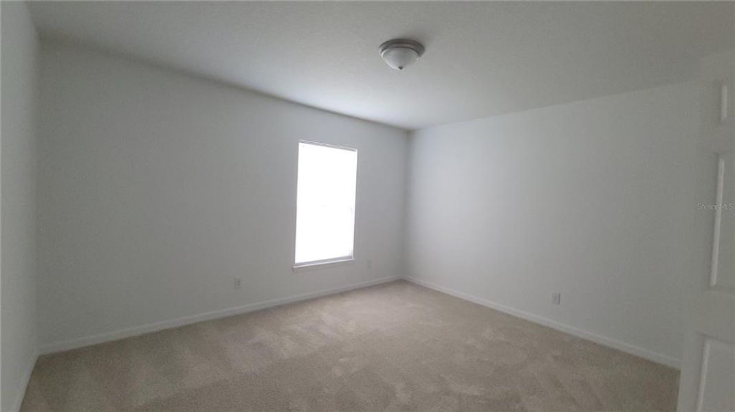 Spacious, unfurnished interior of a new home in , Daytona Beach (Image 11).