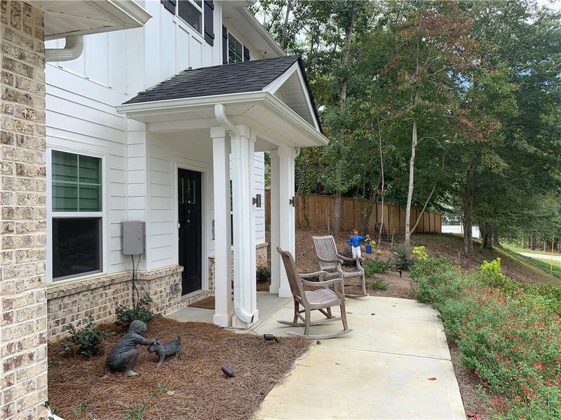 Exterior details and patio area of a home in Holiday Pines, Buford (Image 1).