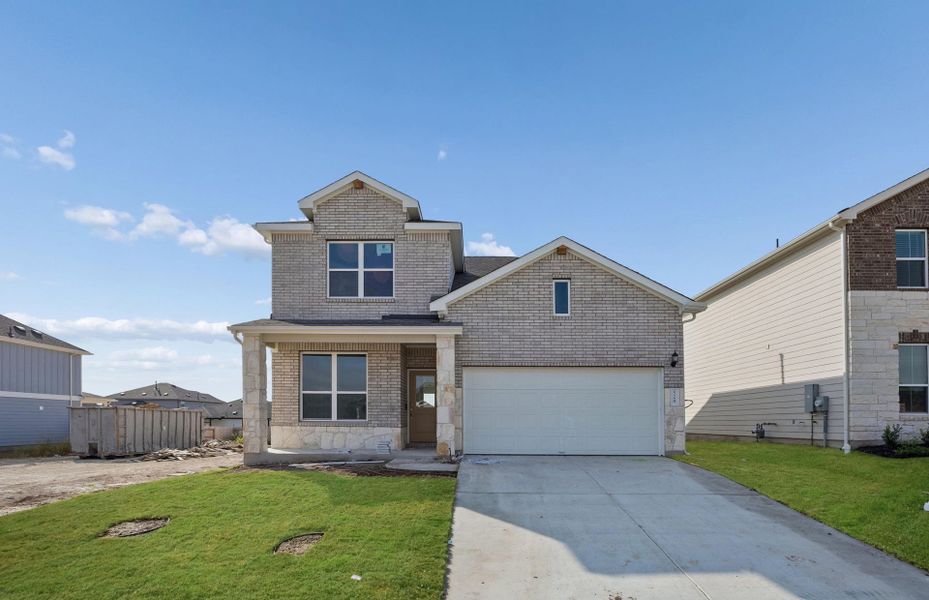 Front exterior of a new home in Patterson Ranch, Georgetown, TX, highlighting curb appeal (Image 19).