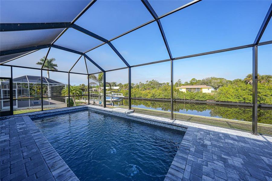 Exterior details and patio area of a home in , Port Charlotte (Image 24).