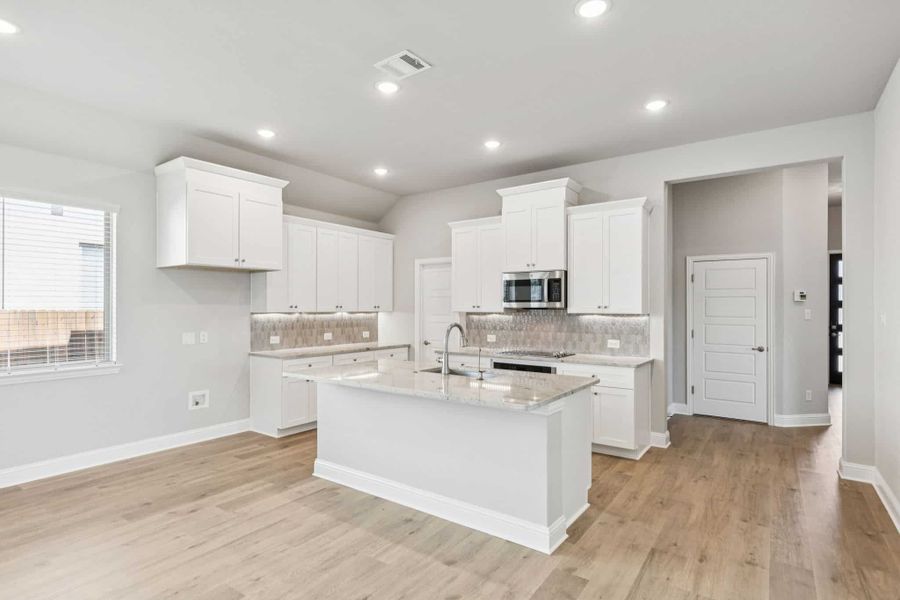 Furnished interior view inside a new home in Heartland, Heartland (Image 5).