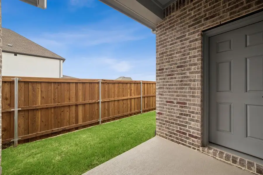 Exterior details and patio area of a home in Talia – Cottage Series, Mesquite (Image 2).