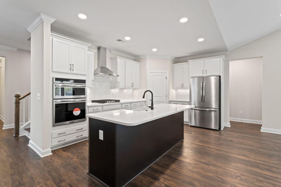 Furnished interior view inside a new home in Tidewater at Lakes of Cane Bay, Summerville (Image 9).