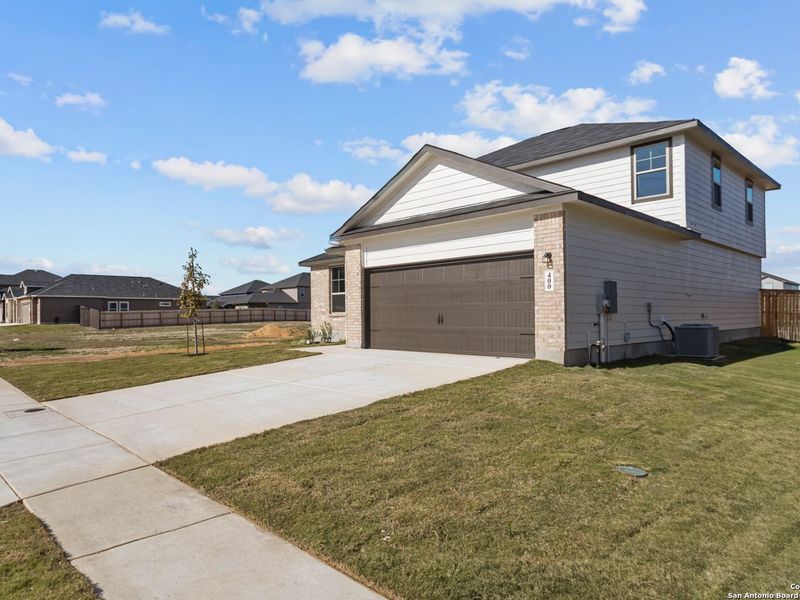 Front exterior of a new home in Hannah Heights, Seguin, TX, highlighting curb appeal (Image 28).