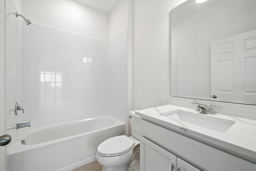Representative furnished interior of a home built from the Wilshire Executive by Landsea Homes in Storey Creek, Kissimmee (Image 6).