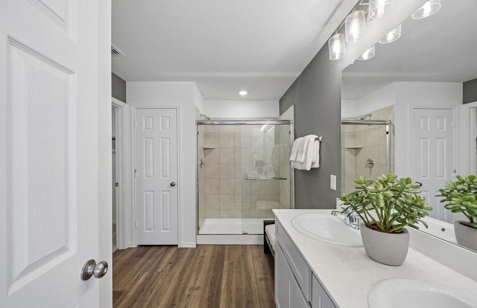 Representative furnished interior of a home built from the Camelia by Pulte Homes in Saddleback at Santa Rita Ranch, Liberty Hill (Image 12).