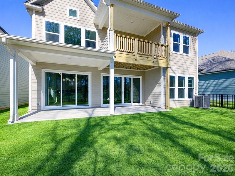 Exterior details and patio area of a home in North Creek Village, Huntersville (Image 28).