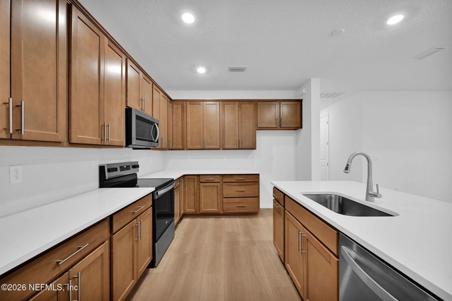 Furnished interior view inside a new home in Hyland Trail, Green Cove Springs (Image 5).