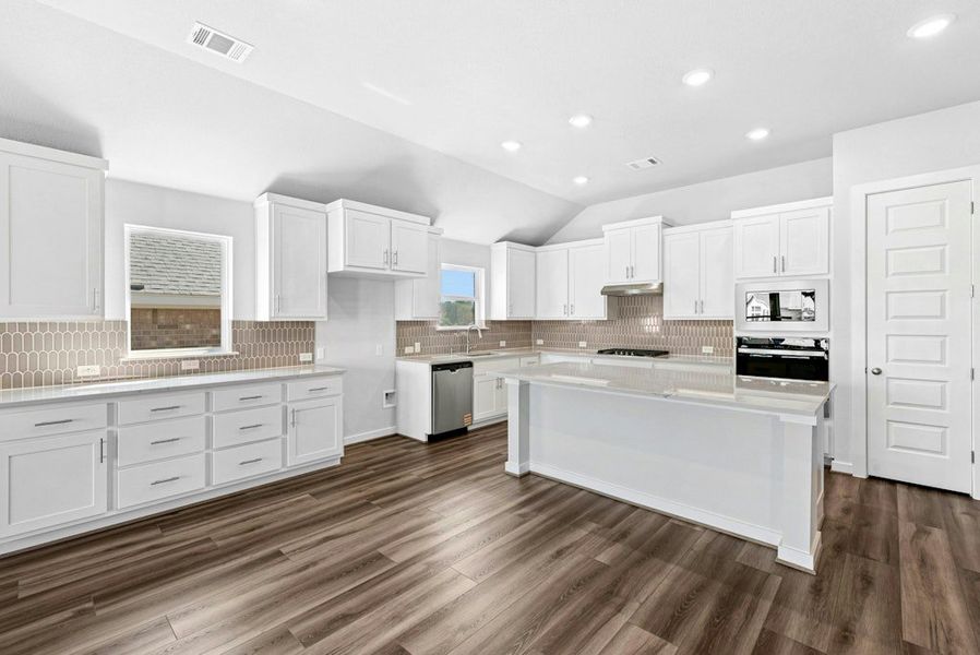 Furnished interior view inside a new home in The Colony, Bastrop (Image 9).