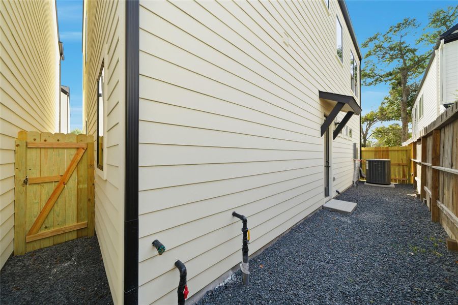 Exterior details and patio area of a home in , Houston (Image 4). Exterior details and patio area of a home in , Houston (Image 4).