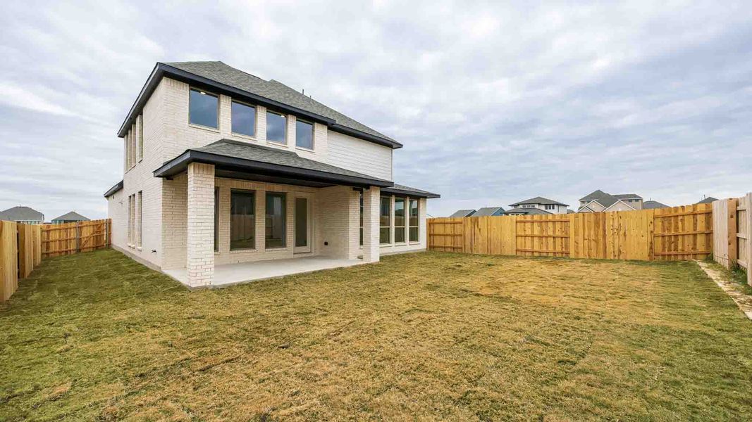 Exterior details and patio area of a home in Lariat 45', Liberty Hill (Image 2). Exterior details and patio area of a home in Lariat 45', Liberty Hill (Image 2).