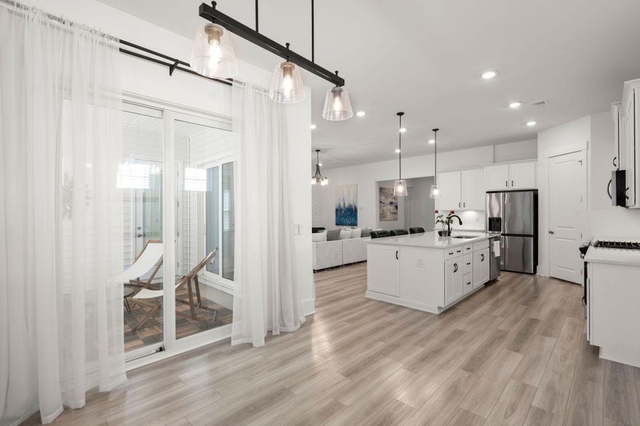 Furnished interior view inside a new home in Summerwind Crossing at Lakes of Cane Bay, Summerville (Image 11).