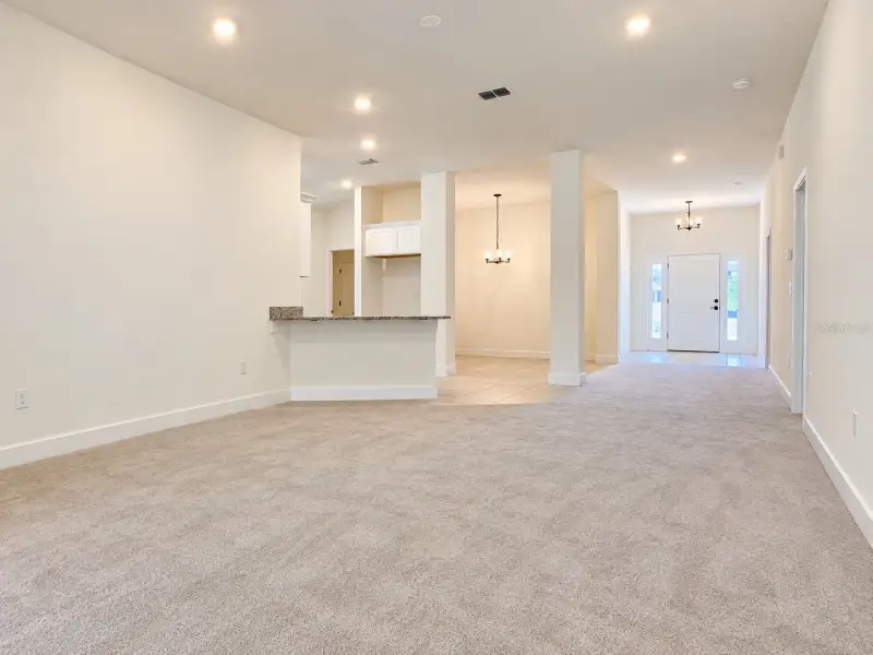 Spacious, unfurnished interior of a new home in Harmony Central, St. Cloud (Image 11).
