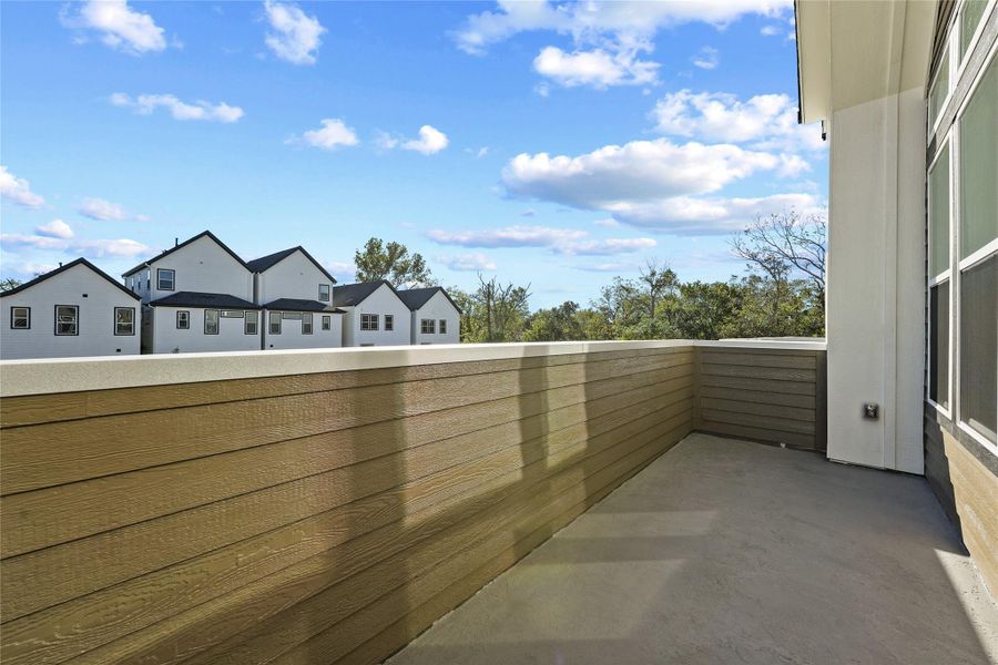 Front exterior of a new home in Highland Commons, Houston, TX, highlighting curb appeal (Image 15).