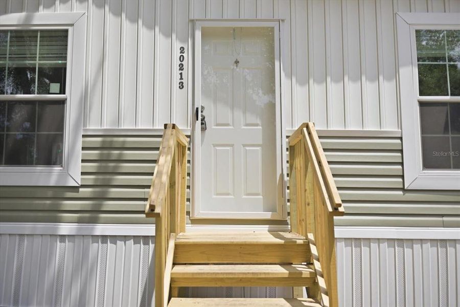 Exterior details and patio area of a home in , Okeechobee (Image 14).