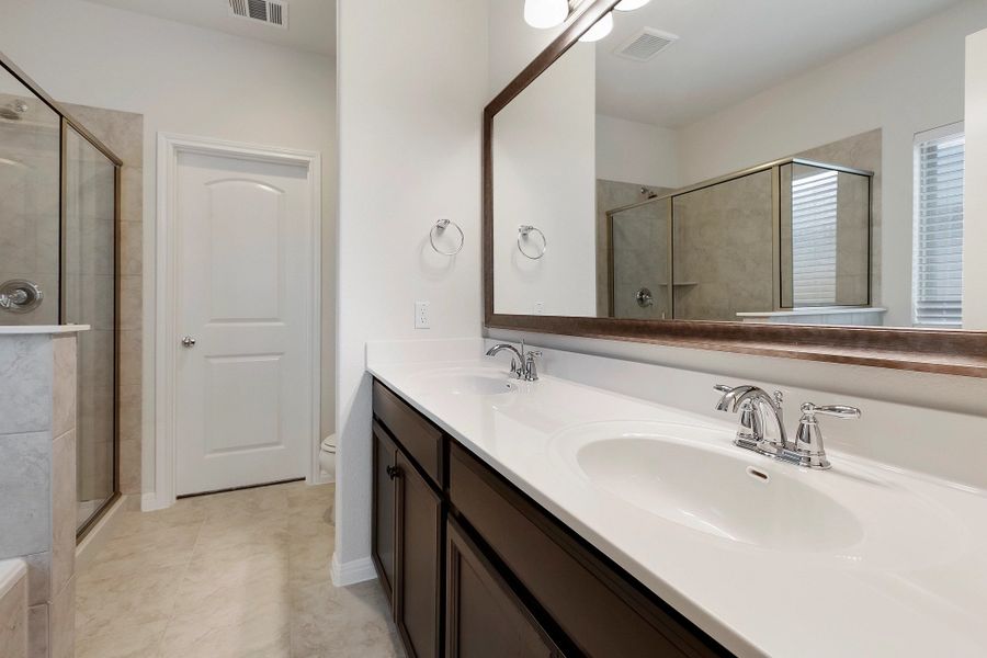 Representative furnished interior of a home built from the Cambridge by Ashton Woods in Lagos Reserve, Manor (Image 10). Representative furnished interior of a home built from the Cambridge by Ashton Woods in Lagos Reserve, Manor (Image 10).