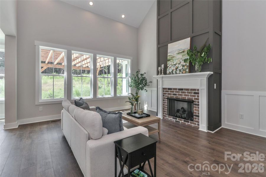 The stunning and cozy gas fireplace anchors the living room with warmth and elegance. The stunning and cozy gas fireplace anchors the living room with warmth and elegance.