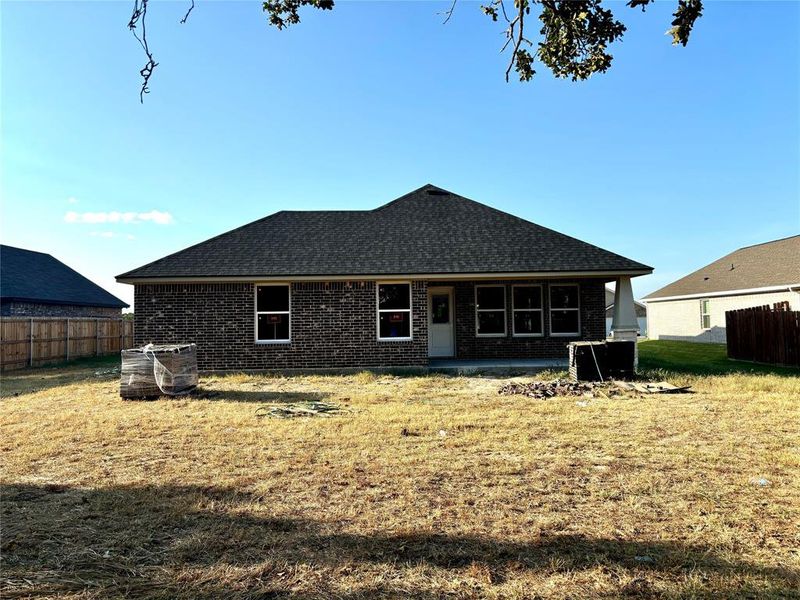 Back of house with patio