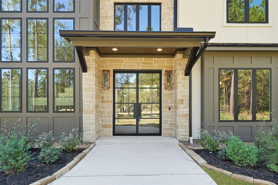 Beautiful doors adorned with elegant gas lanterns