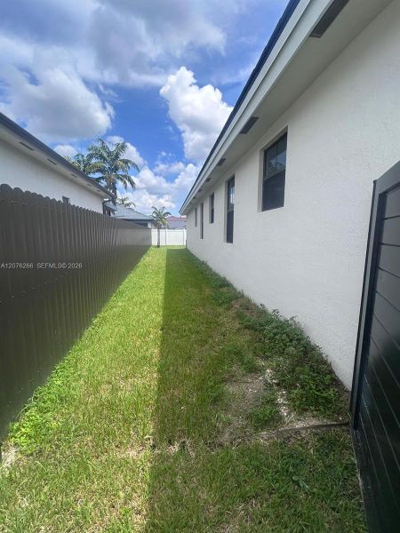 Exterior details and patio area of a home in , Miami (Image 2). Exterior details and patio area of a home in , Miami (Image 2).