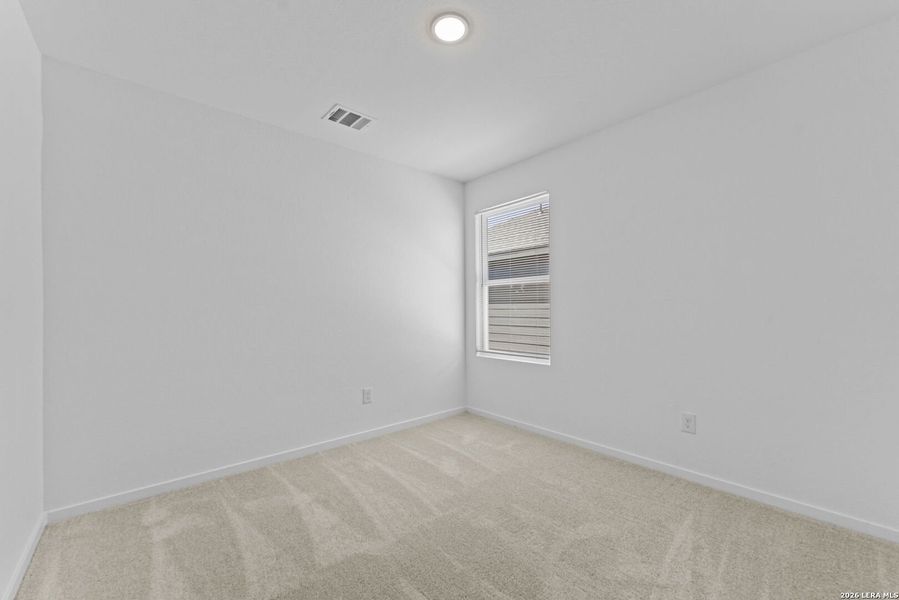 Spacious, unfurnished interior of a new home in Guadalupe Ridge, New Braunfels (Image 10).