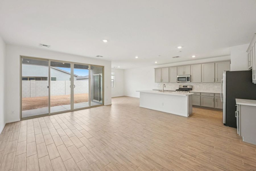 Great room, kitchen and dining