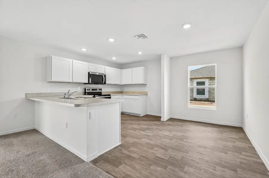 Furnished interior view inside a new home in Richmond Cove, Palm Bay (Image 4). Furnished interior view inside a new home in Richmond Cove, Palm Bay (Image 4).