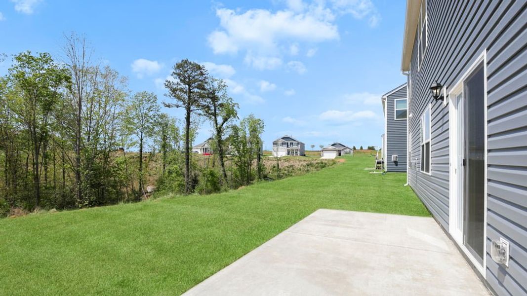 Exterior details and patio area of a home in Hunters Ridge, Woodruff (Image 25).