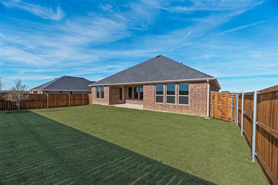 Exterior details and patio area of a home in Arbors at Legacy Hills, Celina (Image 23).