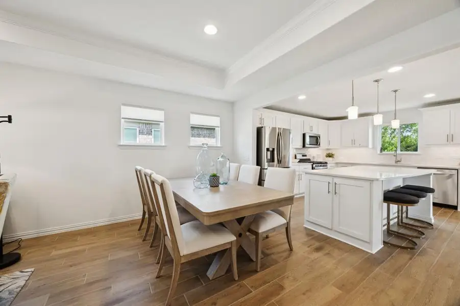 Another view of the dining space showing the easy access to the kitchen.