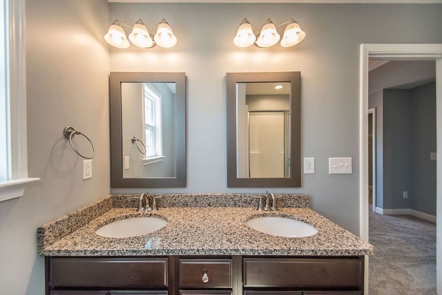 Representative furnished interior of a home built from the Jackson by Enchanted Homes in Lonesome Dove, San Antonio (Image 27).